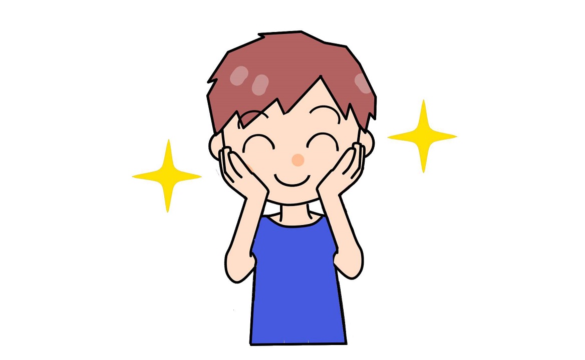 頬を軽く叩く少年の画像