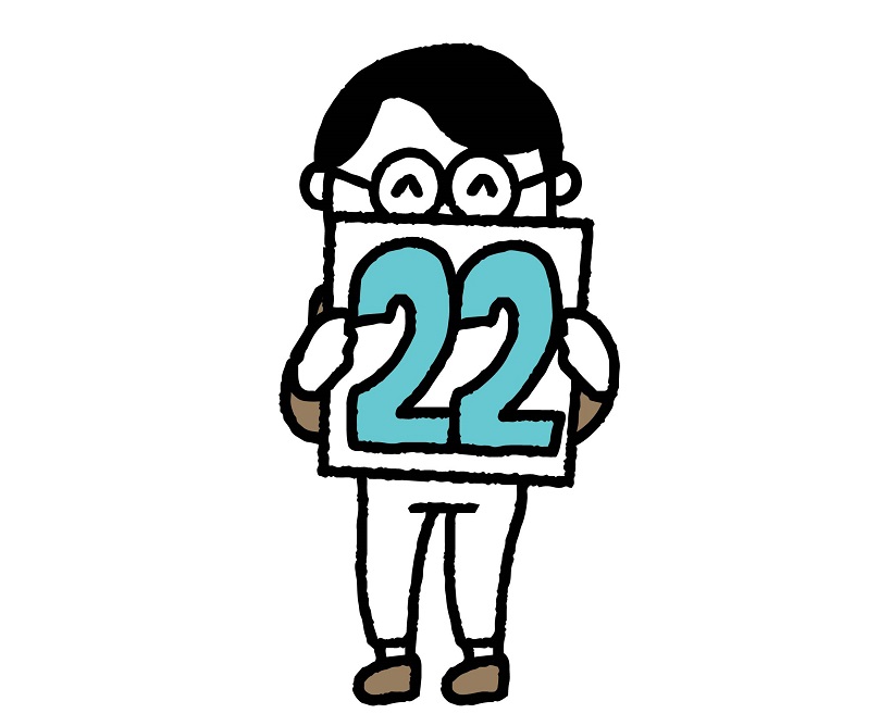 22歳であることを示している少年